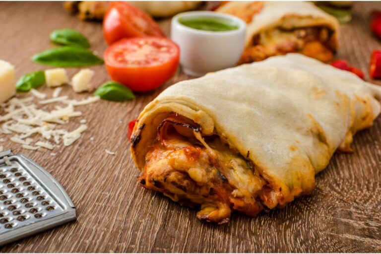 A crisp image of rolled pizza served on.