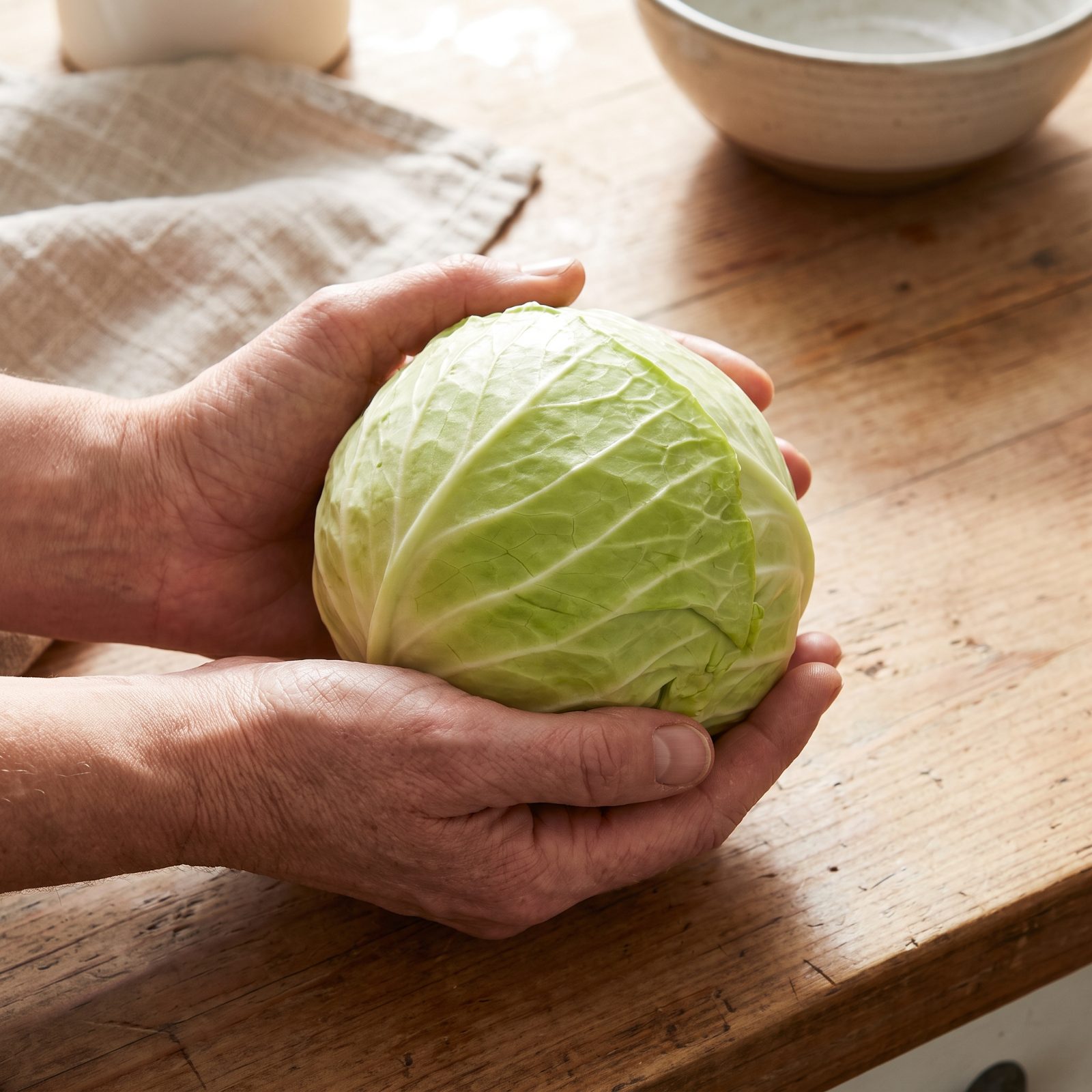 A Head of Green Cabbage the Size of a Softball