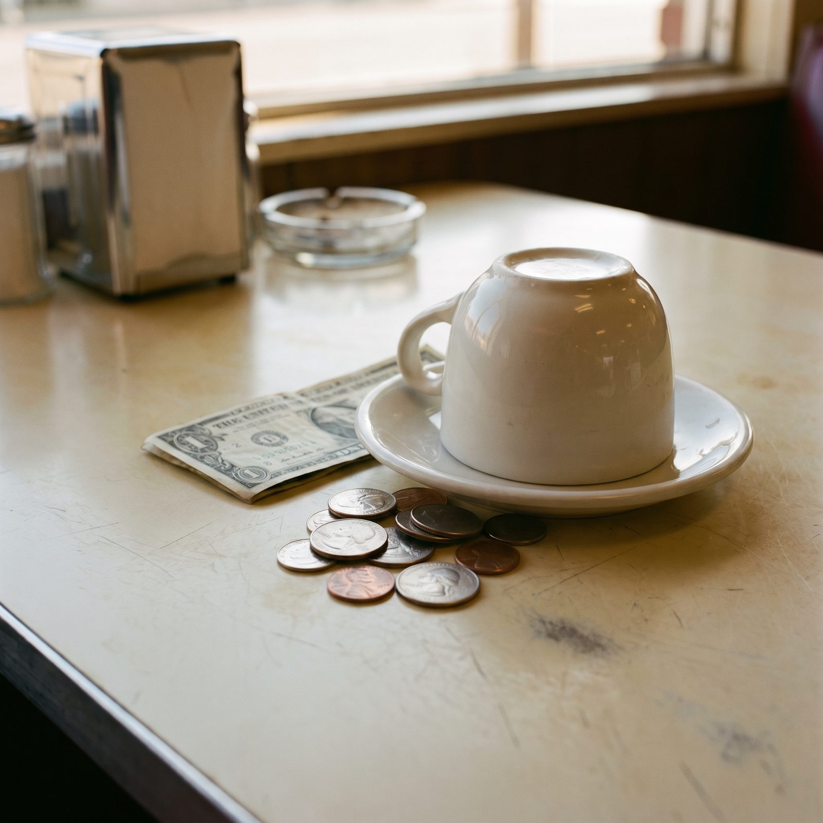 Tips Left as Coins Beneath Coffee Cups