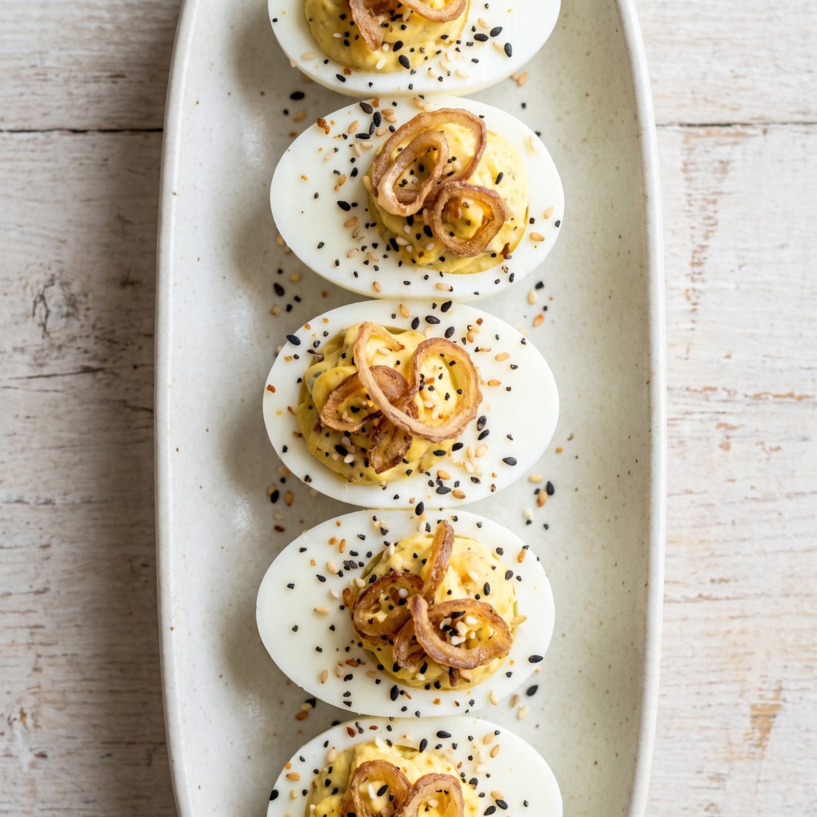 Everything-Spiced Deviled Eggs With Crispy Shallots
